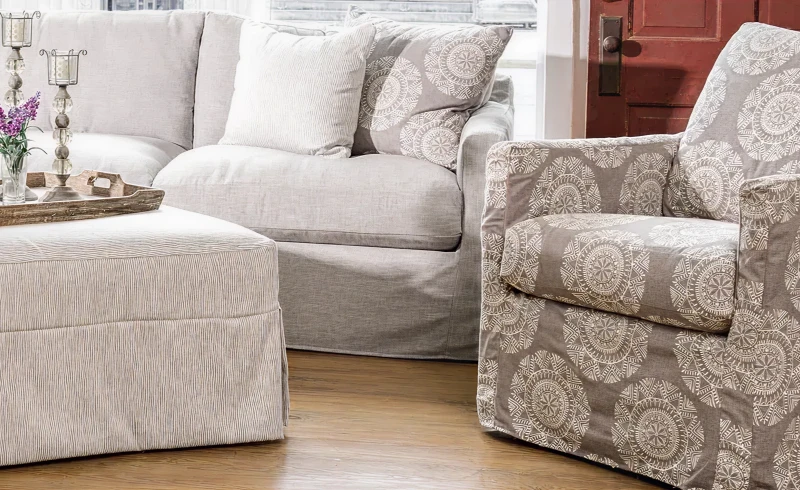 Patterned armchair and beige sofa